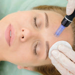 Woman undergoing a dermapen treatment