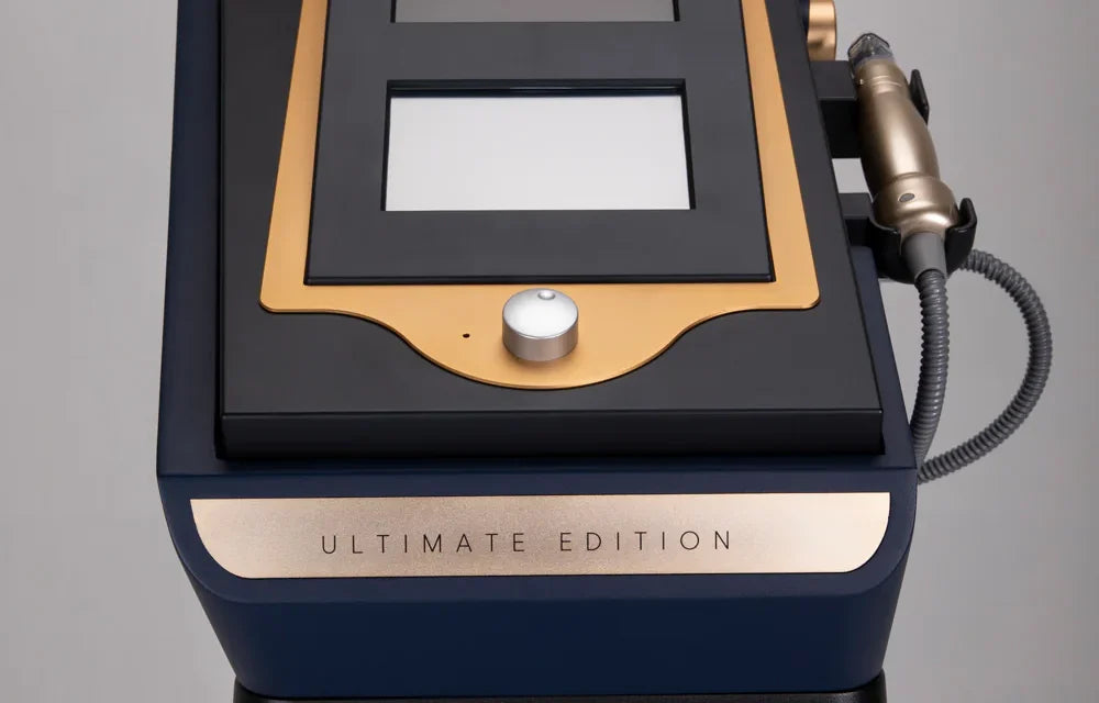 Black and gold device labeled 'Ultimate Edition' on a gray background